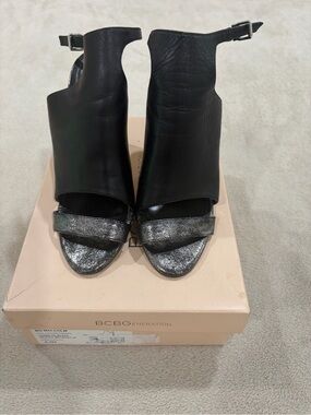 BCBGeneration Black Leather Open-Front Mules with Metallic Silver Toe Strap